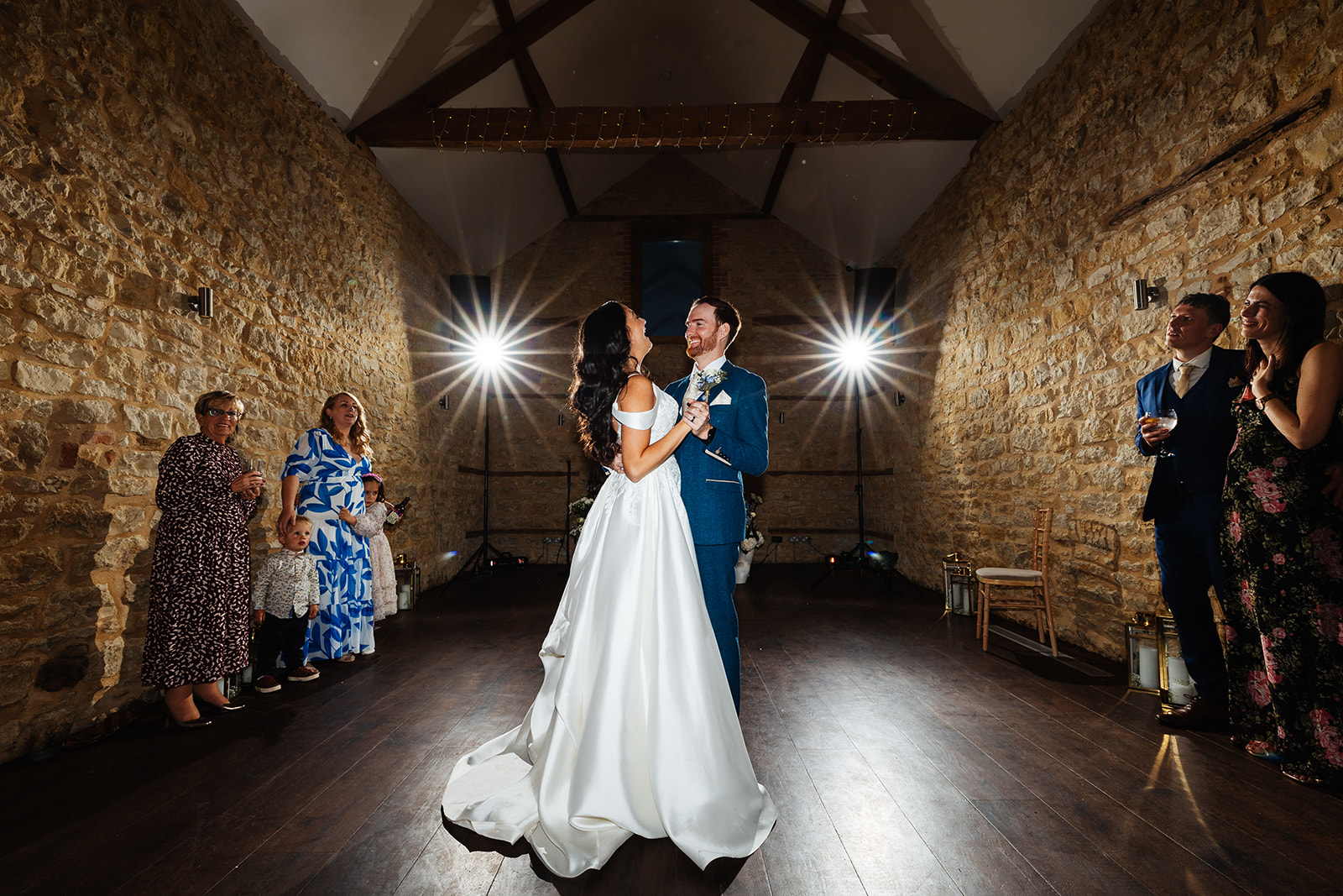 A bride and groom on the dance floor for their first dance