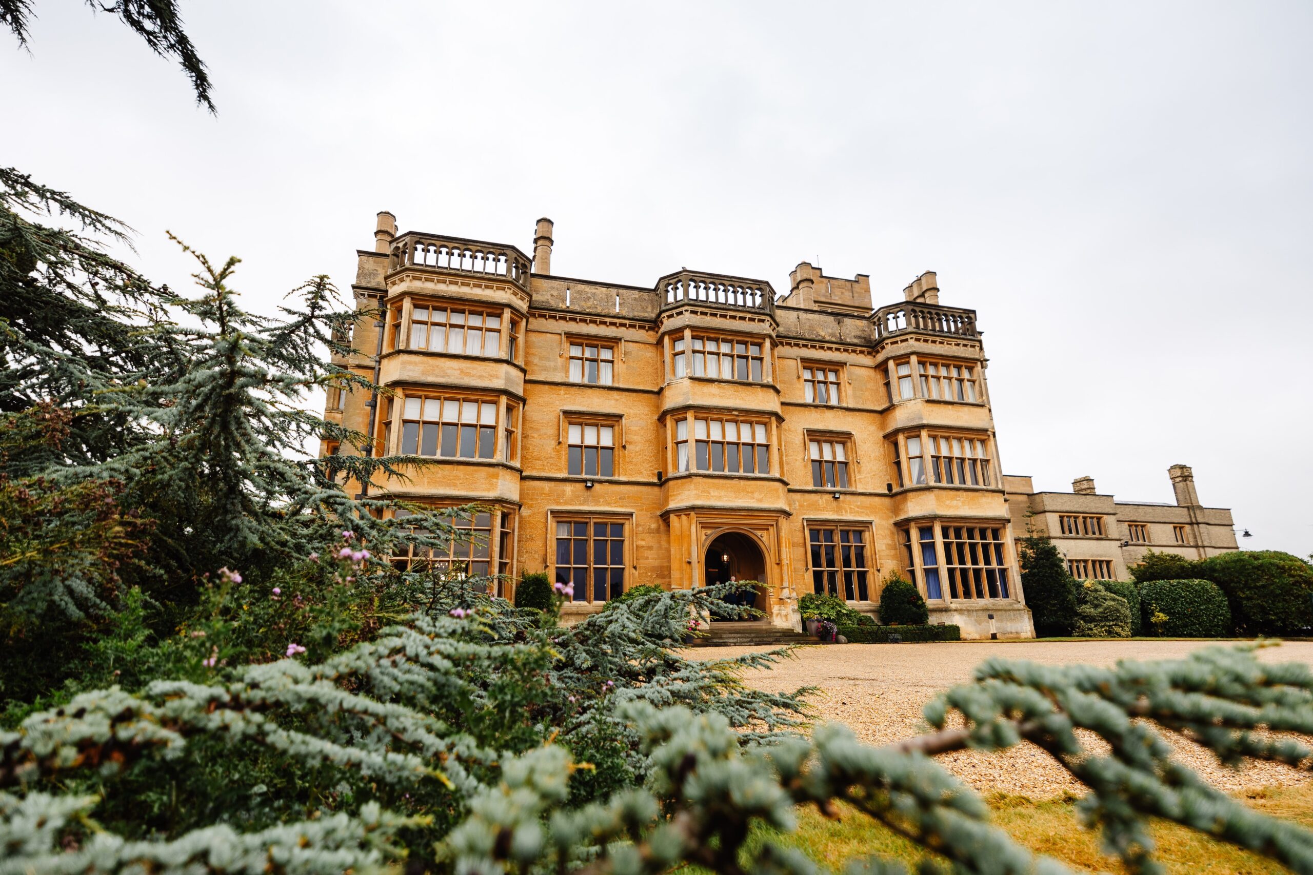 A photo of Shuttleworth House. The sky is a grey colour and the building is grand.